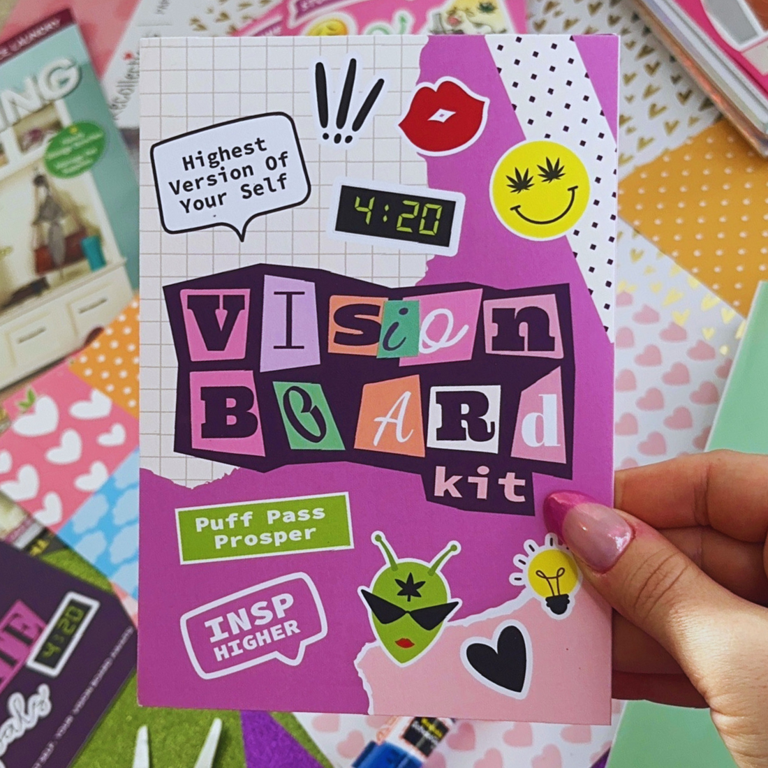 Hand holding a Vision Board Kit for Adults with Vision Board Supplies, featuring colorful stickers, cut-out letters, and crafting materials.