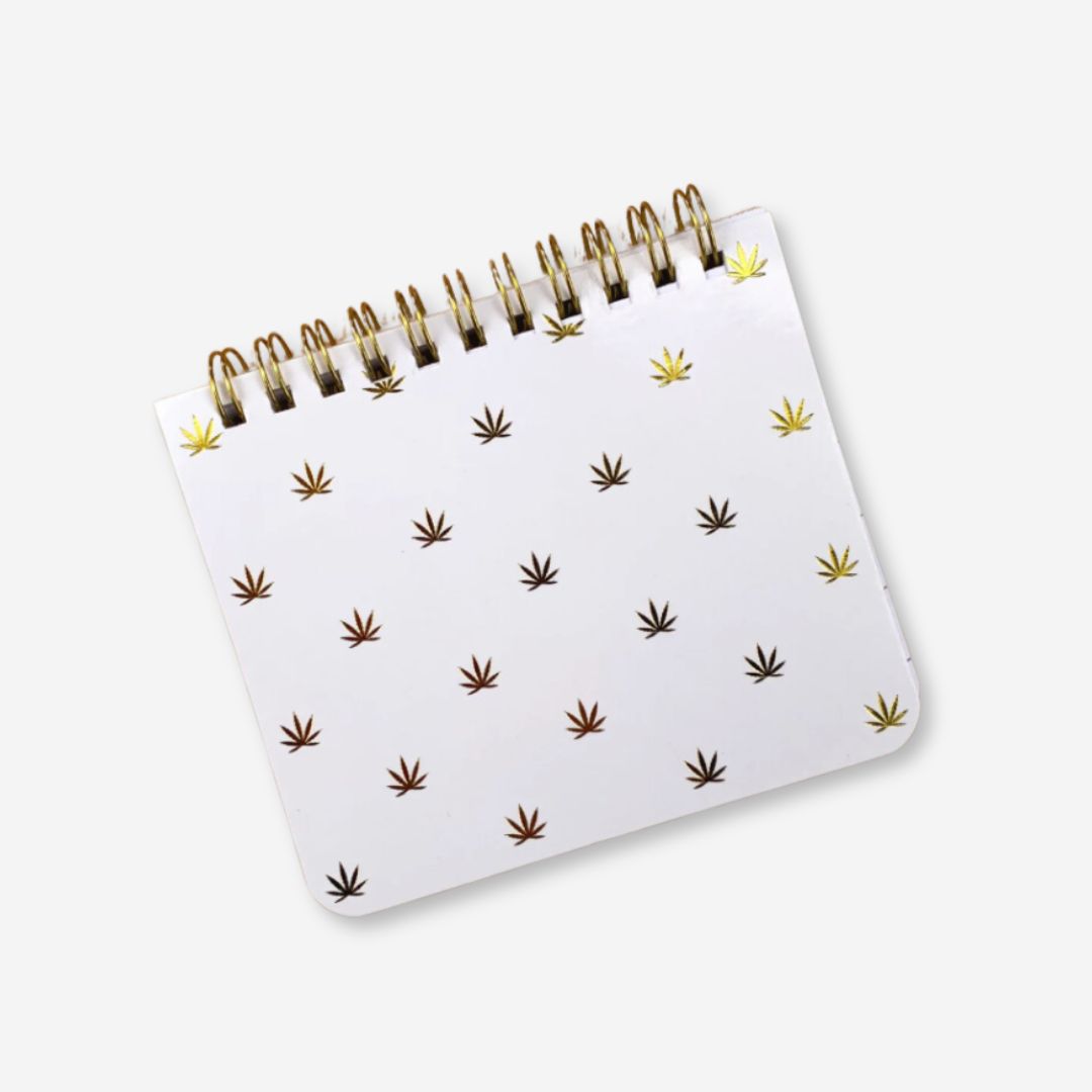 4.25&quot; x 3.5&quot; white mini notebook with gold cannabis leaf design, lined pages, and &quot;High-Dea of the Day&quot; headers.

Let me know if you need any more adjustments! 🌿✨





